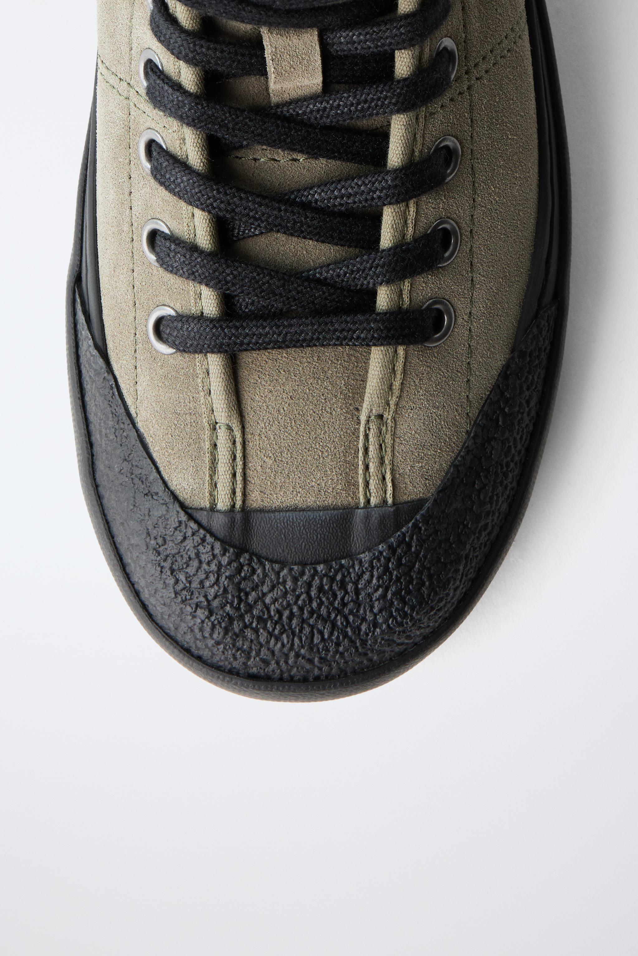 BASKETS MONTANTES EN CUIR